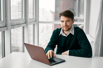 businessman working on laptop in office