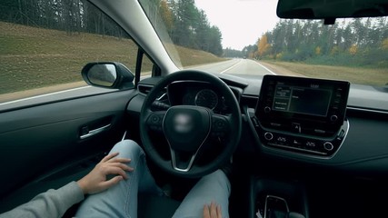 Modern car driving on autopilot. Autopilot car, intelligent vehicle, driveless automobile concept.