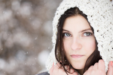 Close up portrait of young beautiful woman in winter