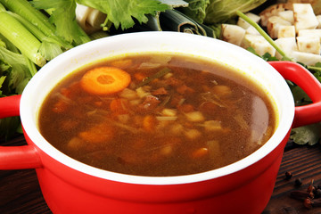 Meat stew with beef, potato, carrot, onion, spices, green peas. Slow cooked meat stew, bowl. Hot autumn or winter dish. Closeup. Comfort food.