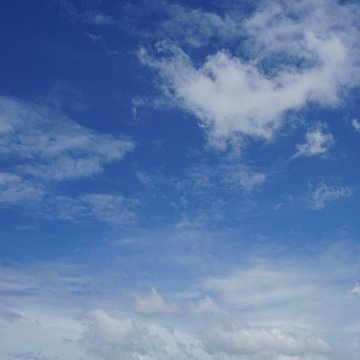 White clouds in blue sky.