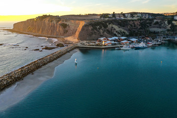 Sunset view of the Dana Point Cliffs from the Harbor