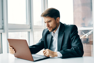 Fototapeta na wymiar businessman working on his laptop