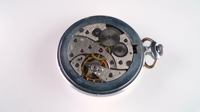 The working mechanism of the old retro pocket watch of the times of the USSR. Close-up Slow motion