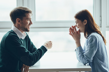 man and woman shaking hands