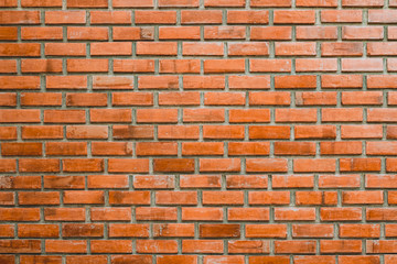 Red brick wall fragment background, texture. or brick layer