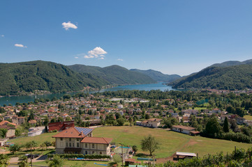 Fototapeta na wymiar View over Magliaso village and Lugano lake