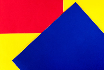 geometric background of red, yellow and blue shapes