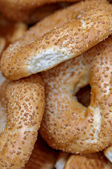 The soft toasted buns are in a box at the grocery store.