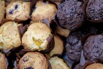 The soft toasted buns are in a box at the grocery store.