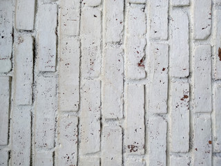 Abstract texture of mossy, porous, cracked and weathered sandstone walls. Wall texture can be used as a wall frame and wall background. Dirty and Old sandstone wall texture background.