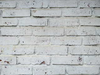 Abstract texture of mossy, porous, cracked and weathered sandstone walls. Wall texture can be used as a wall frame and wall background. Dirty and Old sandstone wall texture background.