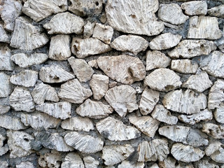 Background with stone. Wall texture can be used as a wall frame and wall background. Dirty and Old coral wall texture background.