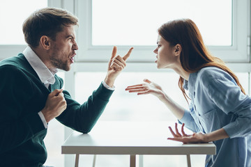 man and woman shaking hands