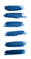 Classic blue color of year 2020 Close up of Blue strokes of watercolor paint of different sizes on...