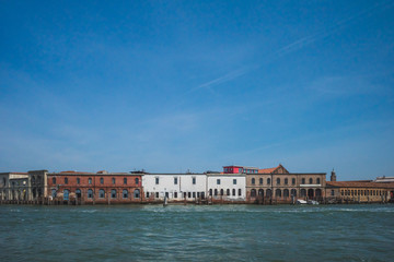 Naklejka premium Glass furnaces of island of Murano by water, Venice, Italy