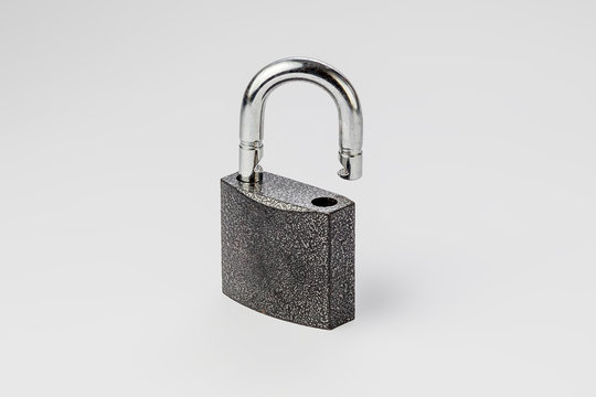 open lock on grey background isolate