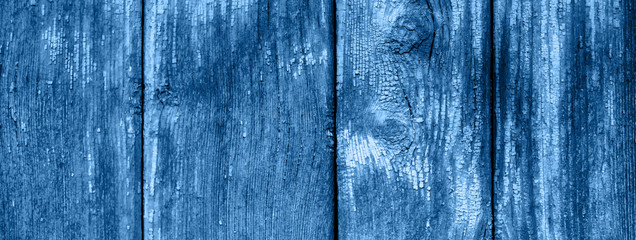 Color of the year 2020. Weathered blue wooden background texture vertical planks