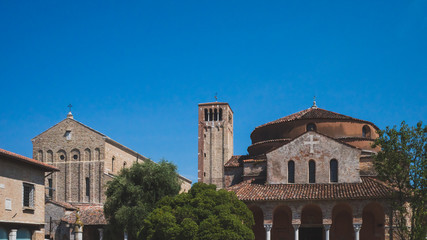 Fototapeta na wymiar Church of Santa Fosca and Cathedral of Santa Maria Assunta on island of Torcello, Venice, Italy