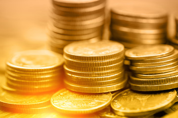 Rows of coins for finance and background saving concept, Gold color
