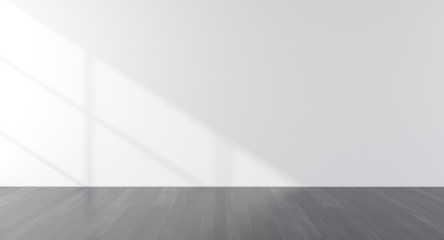 Mock-up of white empty room and wood laminate floor with sun light cast the shadow on the wall,Perspective of minimal inteior design. 3D rendering