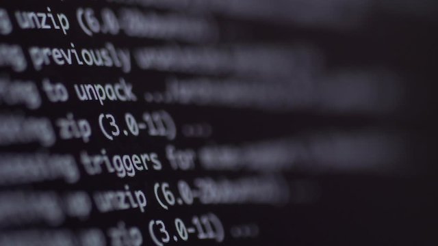 programming code development scrolling on computer screen 4k
