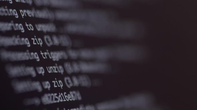 programming code development scrolling on computer screen 4k
