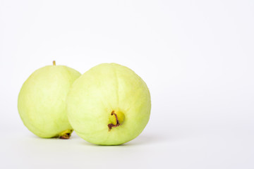 Fresh organic guava tropical fruit on white background. Healthy food high vitamin C concept.