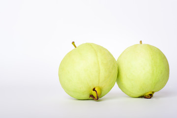 Fresh organic guava tropical fruit on white background. Healthy food high vitamin C concept.