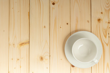Fototapeta na wymiar empty cup on wooden table