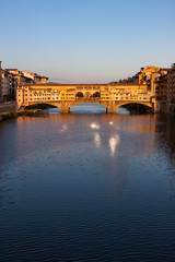 Fototapeta premium Vertical Crop of Ponte Vecchio at Sunset in Florence Italy