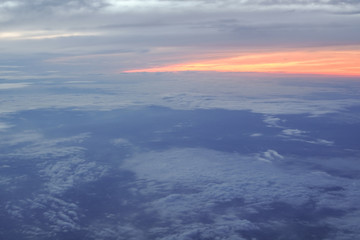 Fototapeta na wymiar sunrise above clouds
