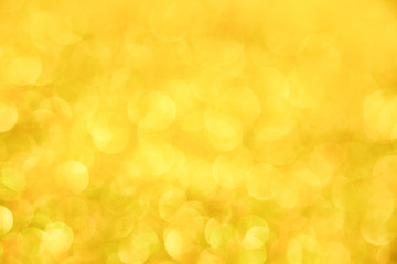 Luxury gold glitter with bokeh background, de-focused. concept for chrismas, holiday, happy new year, festive decoration.