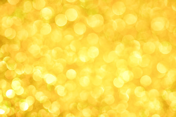 Obraz premium Luxury gold glitter with bokeh background, de-focused. concept for chrismas, holiday, happy new year, festive decoration.
