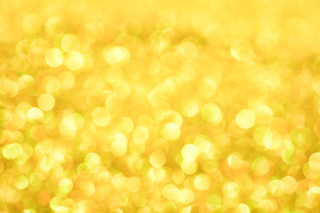 Luxury gold glitter with bokeh background, de-focused. concept for chrismas, holiday, happy new year, festive decoration.