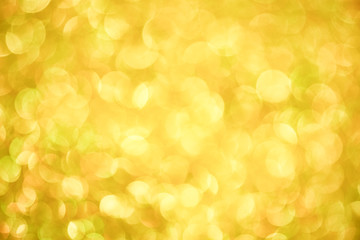 Luxury gold glitter with bokeh background, de-focused. concept for chrismas, holiday, happy new year, festive decoration.