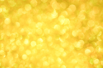 Luxury gold glitter with bokeh background, de-focused. concept for chrismas, holiday, happy new year, festive decoration.