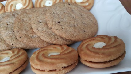 assorted biscuits on wooden table