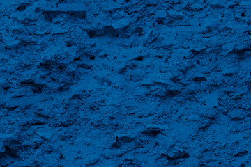 Background of vintage stone wall texture, natural pattern in color of the year 2020