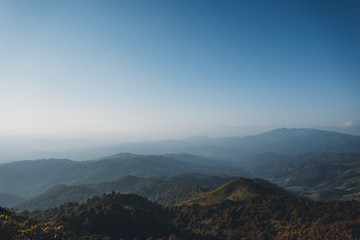 landscape mountains forests sky in the evening