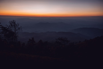 landscape mountains forests sky in the evening