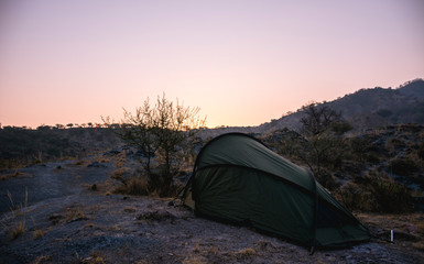 green tent on a fast morning 