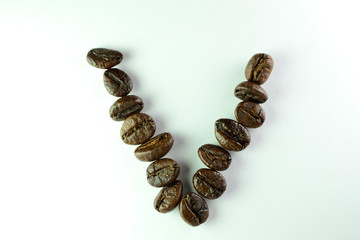 letter V with coffee beans in White background