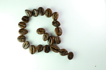 letter Q with coffee beans in White background