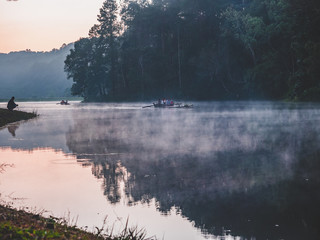 The sunrise and fog on the surface of the Pang Ung reservoir in Mae Hong Son province of Thailand