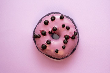 close up of donut on blue background