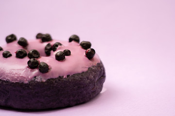 close up of donut on blue background