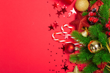Christmas holidays composition on red background with copy space for your text