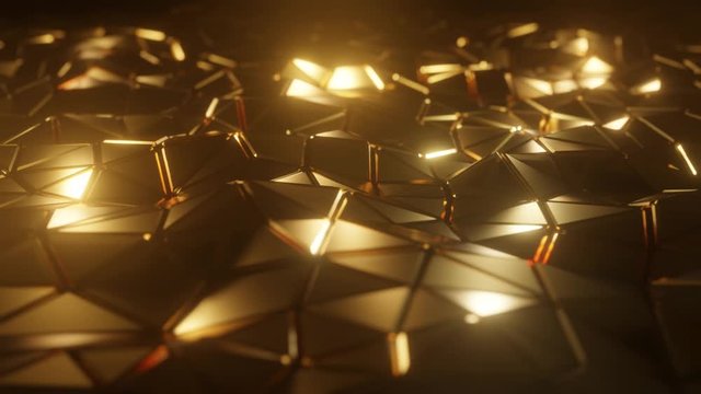 Abstract 3D visualization of a geometric low-poly golden surface. Computer animation loop. Modern background with polygonal gold shape. Loopable motion design 4k UHD
