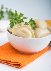 Dumplings with potato filling. Color table. Vareniki. Traditional Ukrainian food. Varenyky with potato